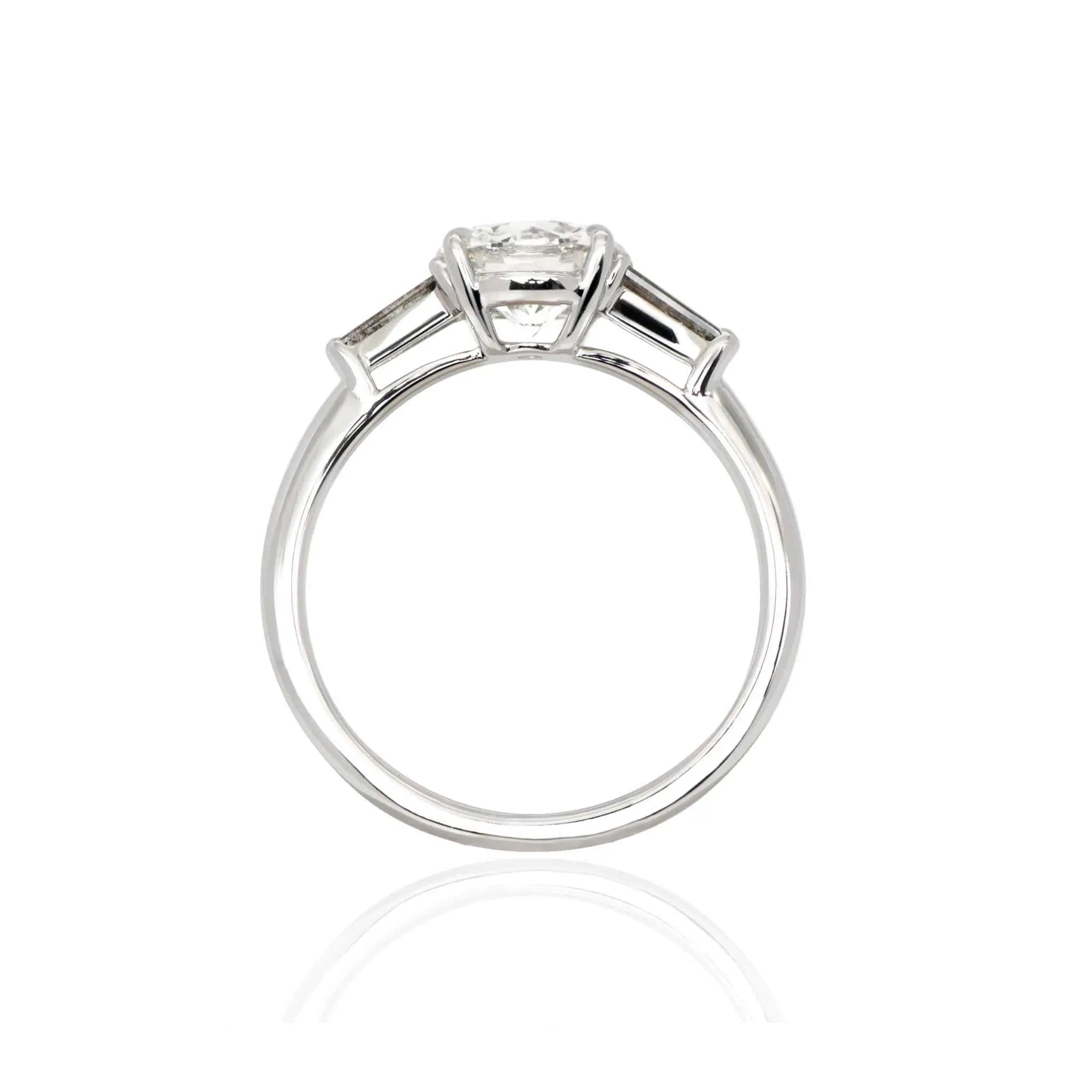Sierra three stone engagement ring with salt-and-pepper center diamond and gray baguette side stones in white gold band