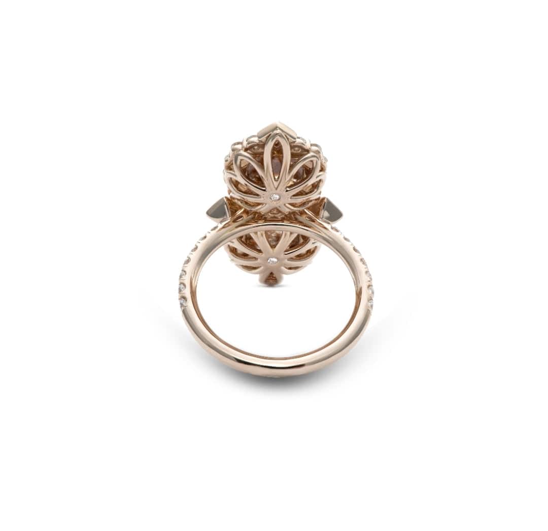 Sherah Rose Cut Diamond Ring in 18K rose gold with intricate floral design and sparkling diamonds and sapphires