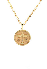 18K yellow gold Zodiac Medallion with birthstone and polished rope border on cable chain