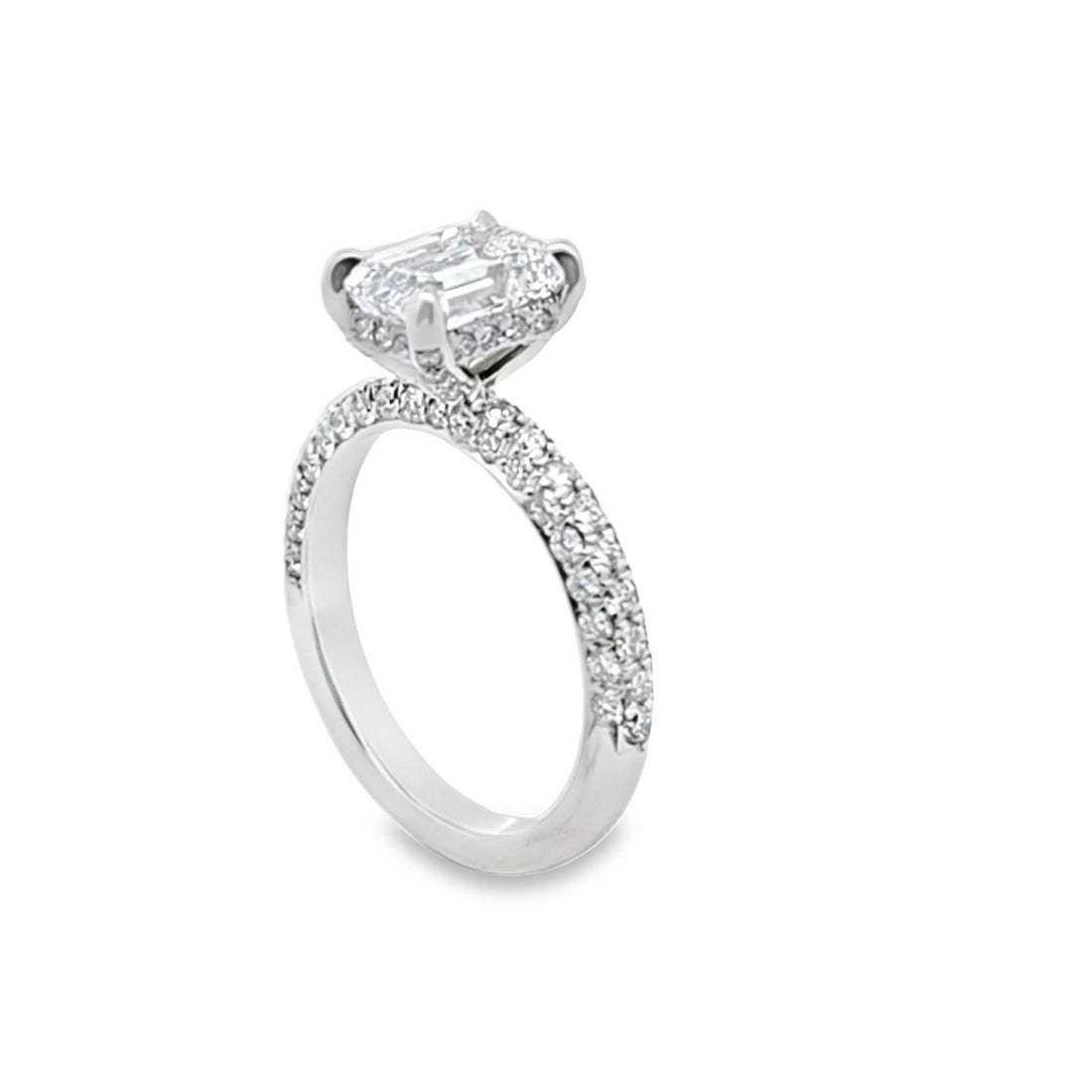 Aria Engagement Ring with 1.5ct emerald-cut diamond, platinum band, hidden halo and three-row pavé diamonds