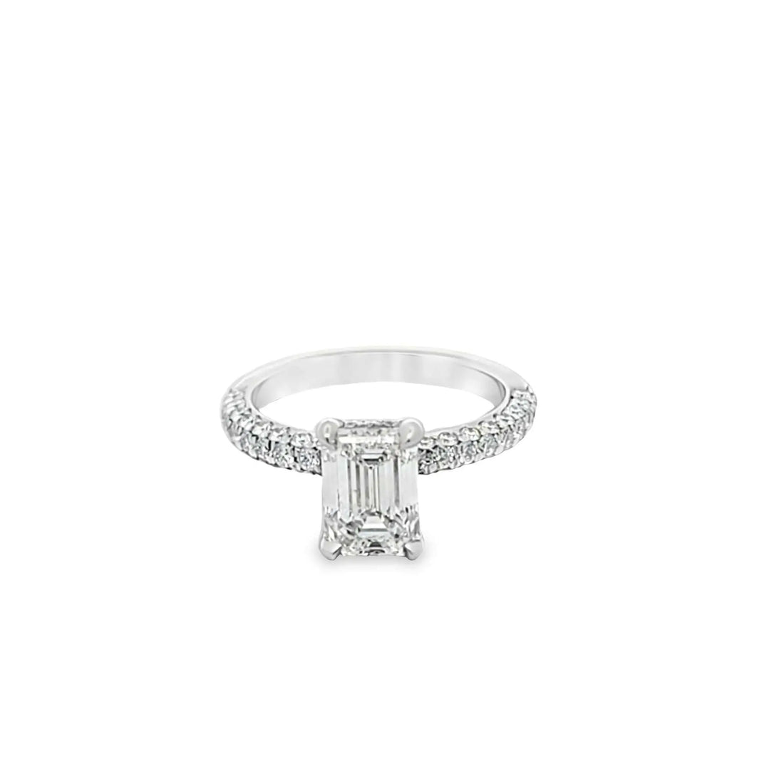 Aria Engagement Ring with 1.5ct emerald-cut diamond, platinum band, hidden halo, and three-row pavé diamonds