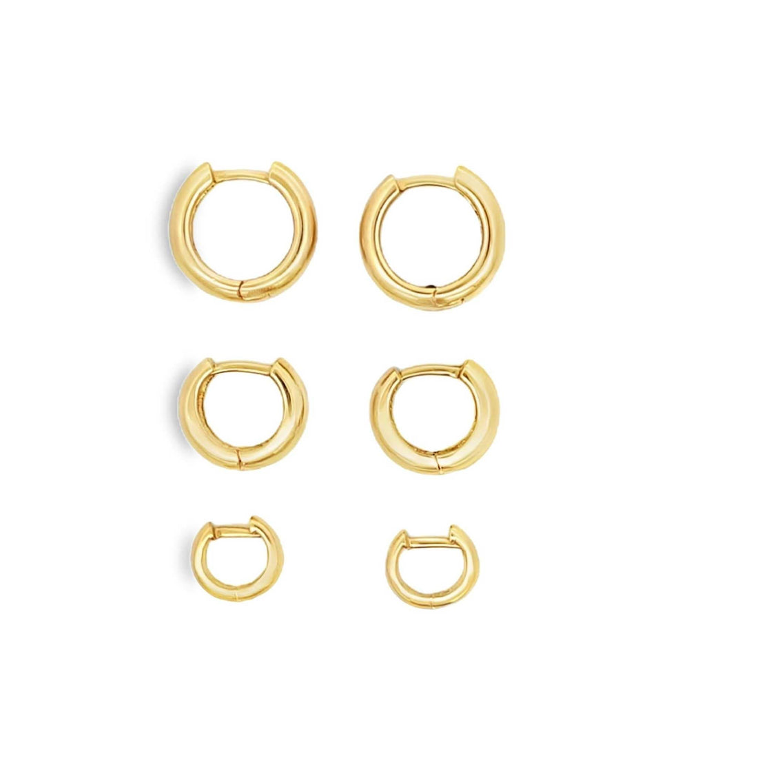 Set of three 18K yellow gold mini hoops in small, medium, and large sizes for elegant everyday wear.