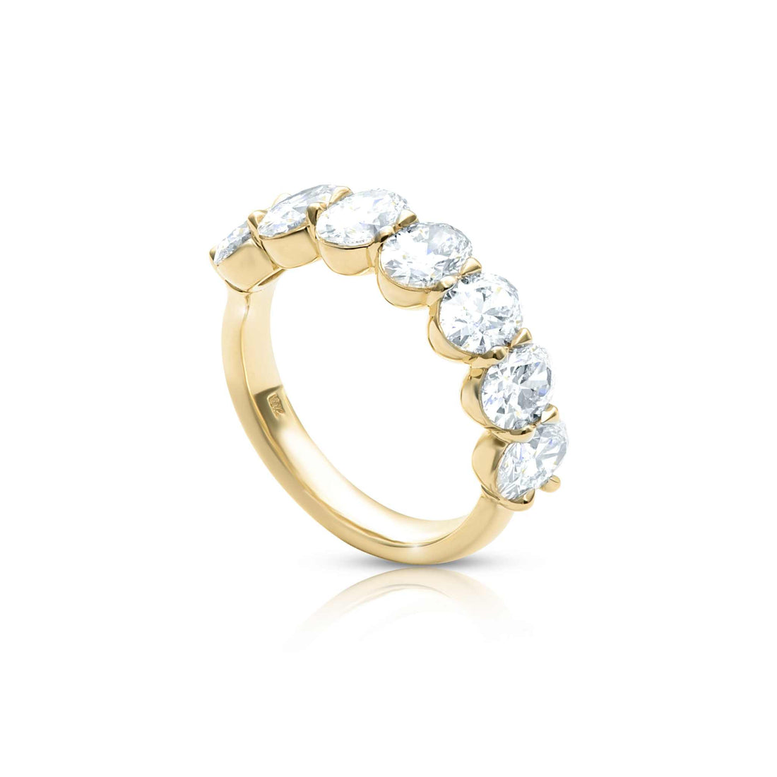 Yellow gold stone anniversary band with seven oval diamonds totaling 1.4ct G VS1