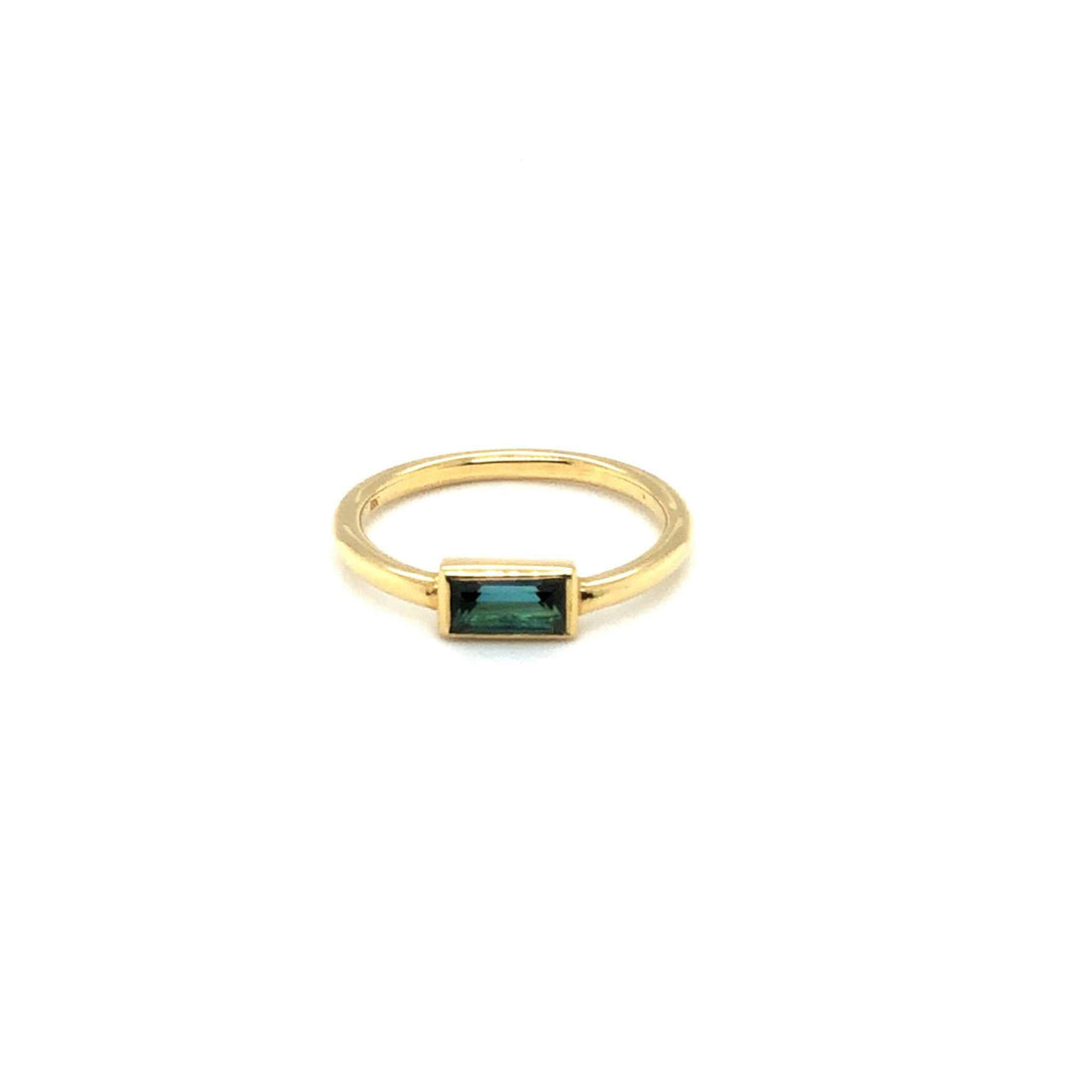 Tourmaline Solitaire Ring with a rectangular blue tourmaline gemstone set in a gold band, showcasing elegant and timeless design.