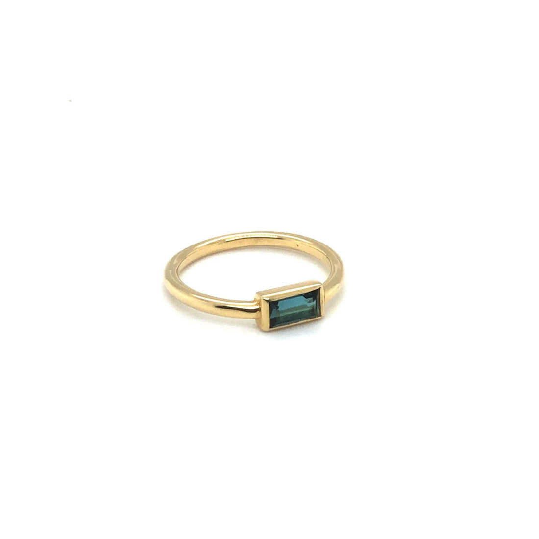Elegant gold Tourmaline Solitaire Ring with rectangular blue tourmaline gemstone.
