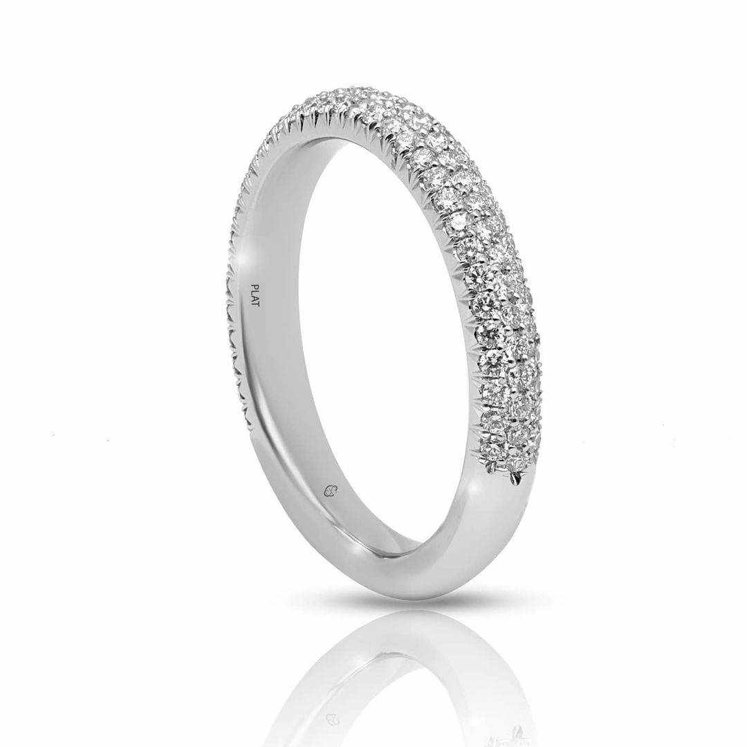 platinum three row pave diamond wedding band with 0.58 carats G VS1 diamonds elegant and timeless design