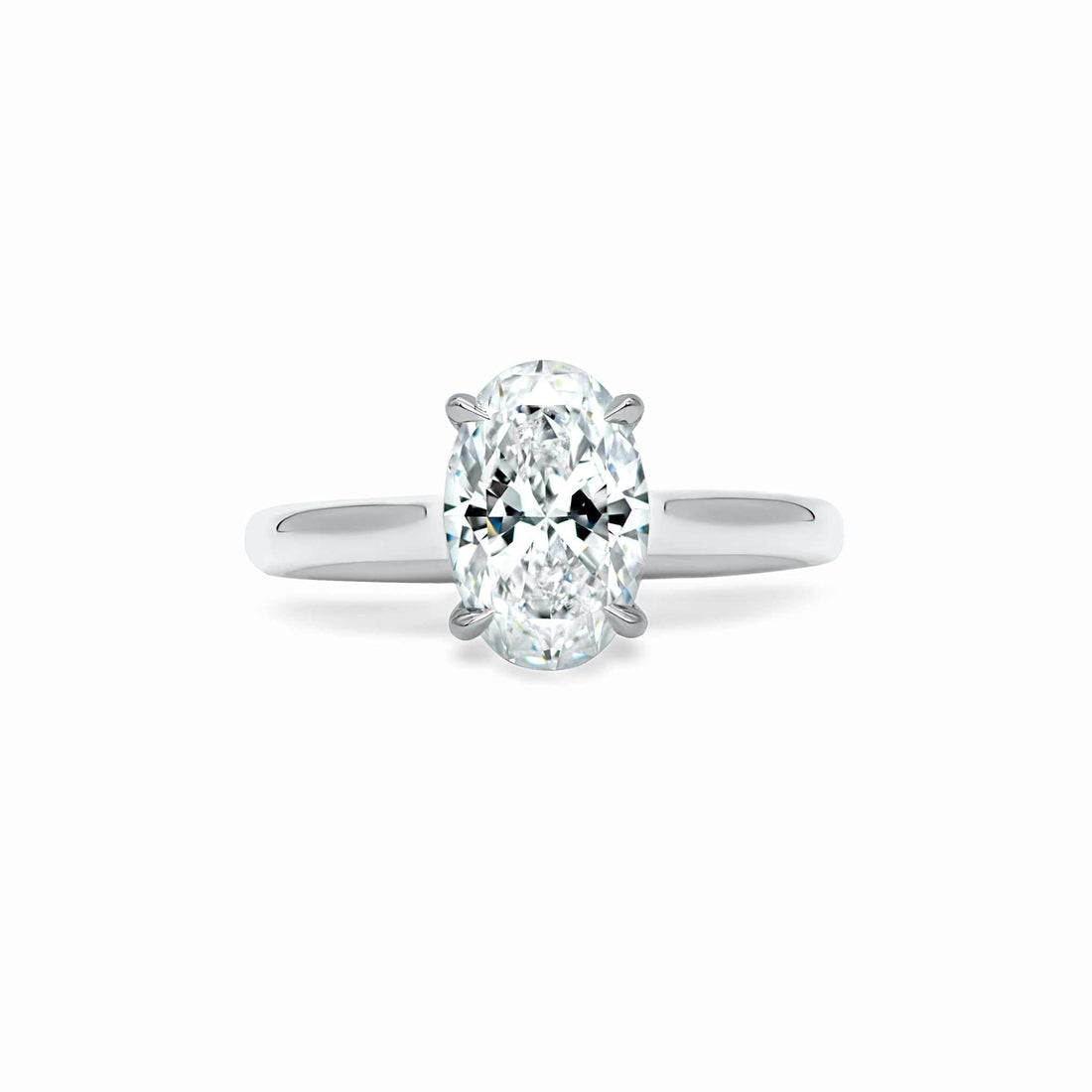 Esmeralda Solitaire Engagement Ring with oval-cut diamond set in platinum band