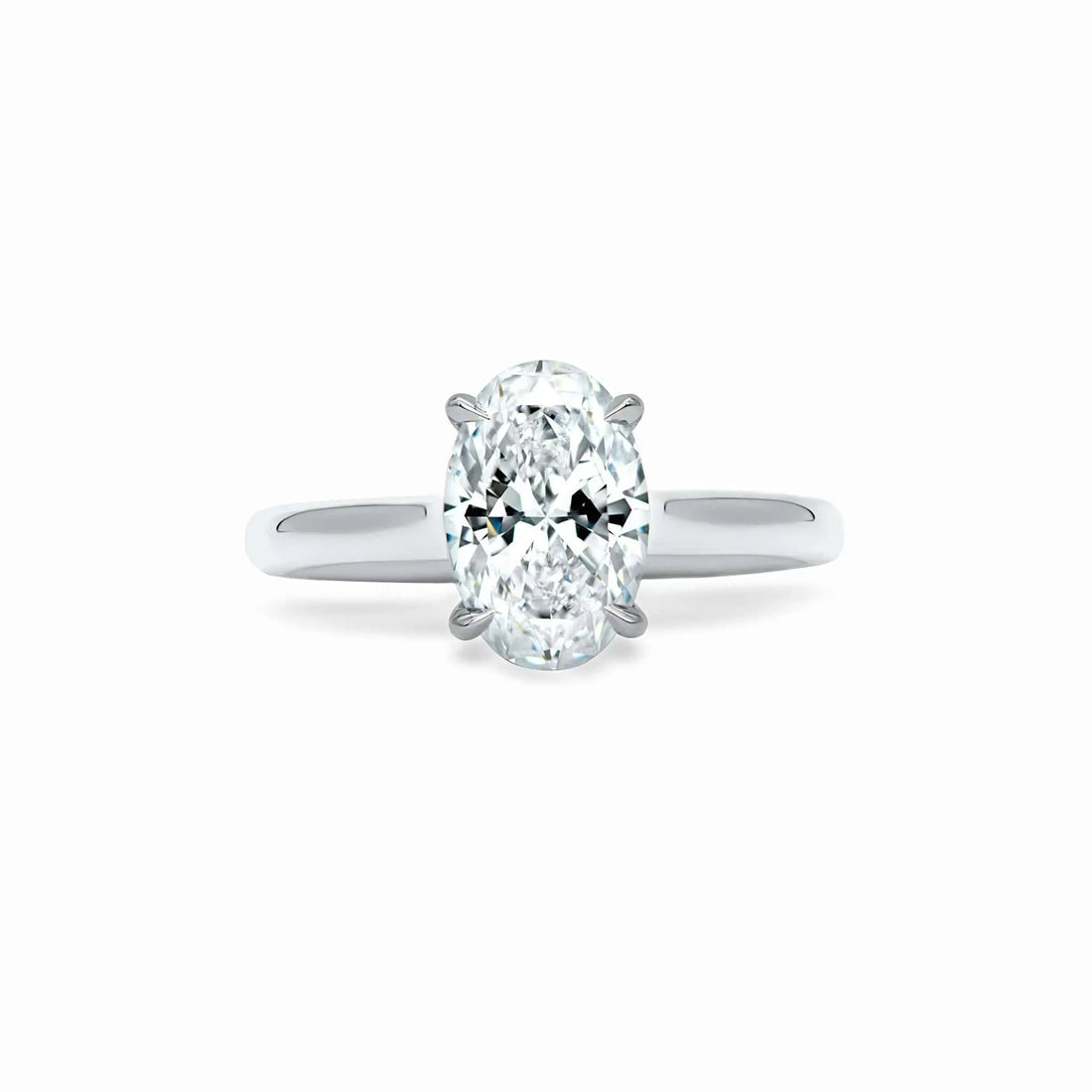 Esmeralda Solitaire Engagement Ring with oval-cut diamond set in platinum band